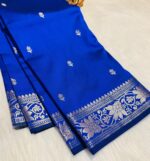"Fighter blue Banarasi soft silk saree with golden zari booti work and elegant woven pallu – lightweight, luxurious saree ideal for weddings and festive occasions."