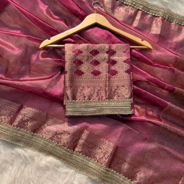 Woman wearing exclusive Rajkumari gulabi tissue silk saree for wedding and festive ethnic styling