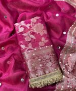 Woman wearing pink designer saree with heavy allover mirror work for wedding and festive partywear styling