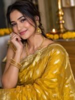 Mustard Yellow Banarasi Tissue Silk Saree with Swarovski stone work, silver zari buti design, and rich zari border by BNS Saree Centre Varanasi.