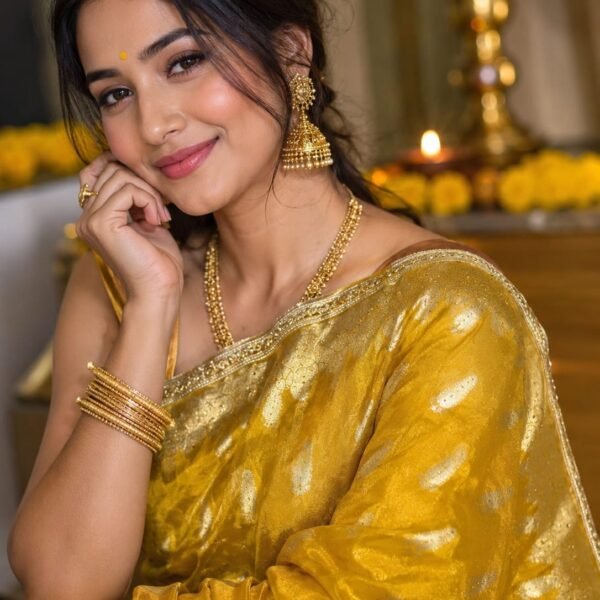 Mustard Yellow Banarasi Tissue Silk Saree with Swarovski stone work, silver zari buti design, and rich zari border by BNS Saree Centre Varanasi.